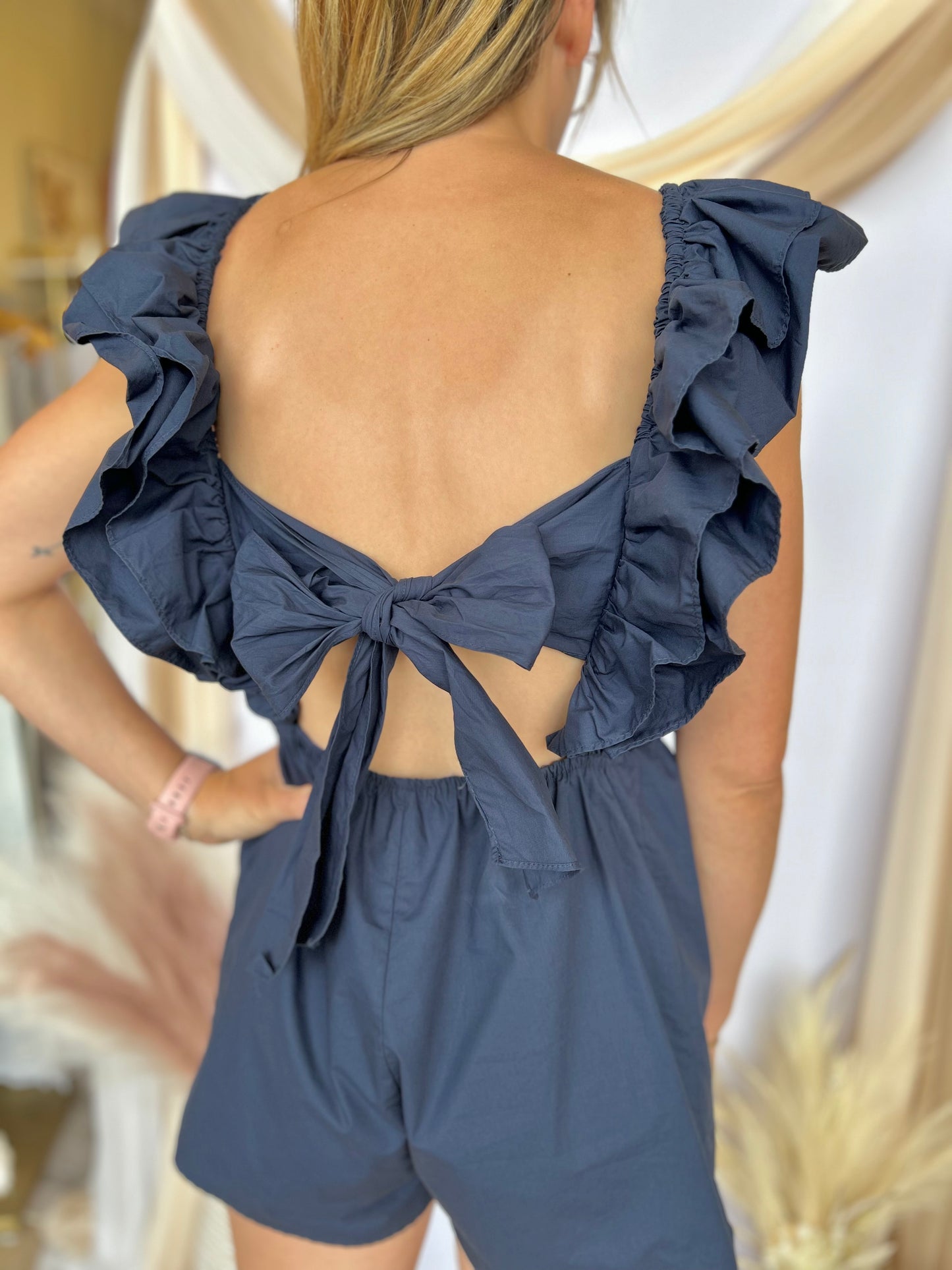 UP YOUR GAME NAVY RUFFLE ROMPER