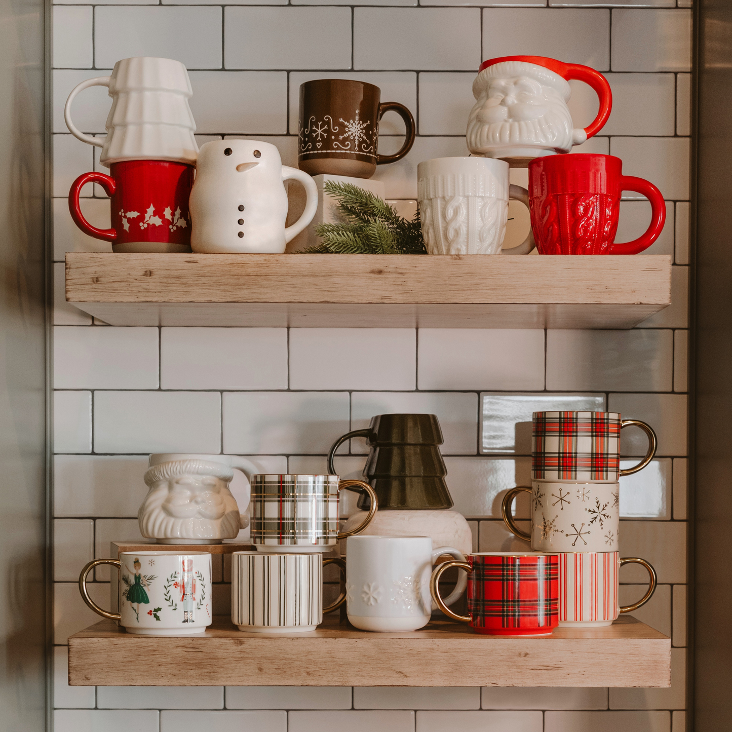 Collection of mugs on wooden shelves against a tiled wall.