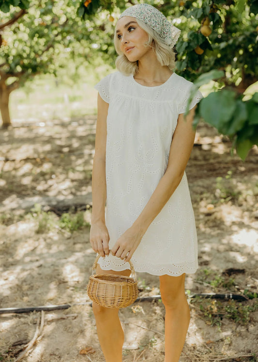 THE MILLER IN WHITE DRESS