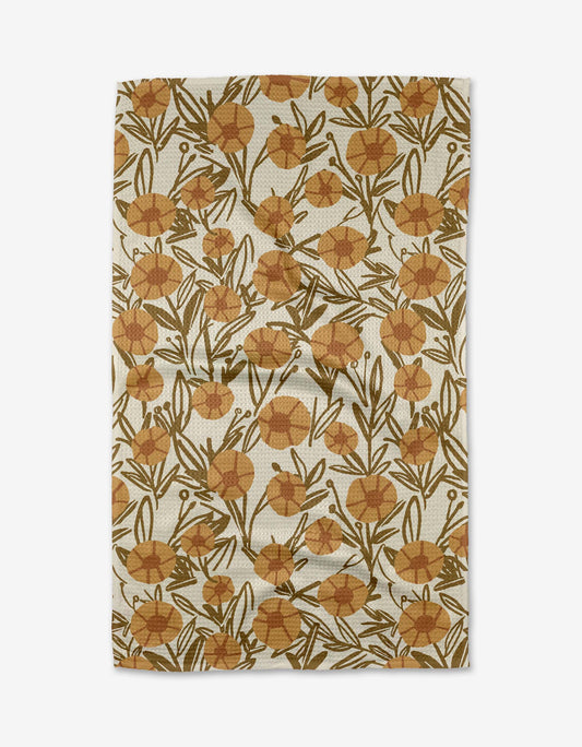 Floral patterned rug with brown flowers on a beige background